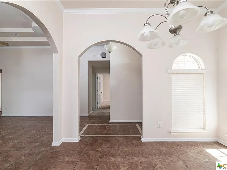 Formal dining off entry and formal living room.