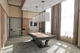 3rd image of 100 Harrison Garden Blvd Unit Penthouse 14-14