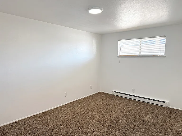 Larger bedroom of the two