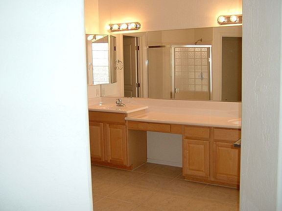 Master Bath with Dual vanities, make-up area and seperate shower and tub.