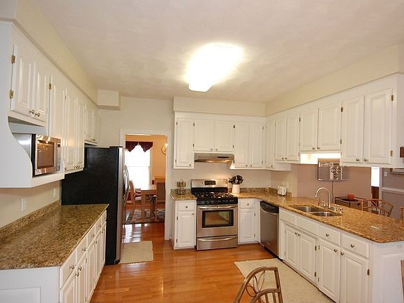 Upgraded kitchen with granite, stainless steel appliances and tons of cabinets