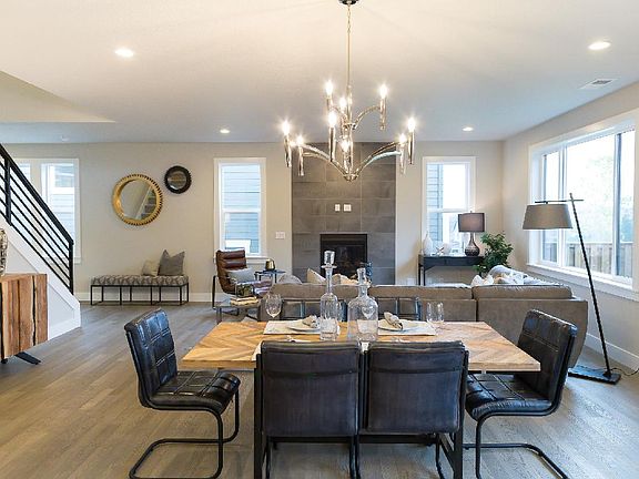 Dining Room and Family Room - Photos are from a similar home