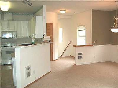 Living room and adjoining dining room are spacious. 9' ceilings throughout. 