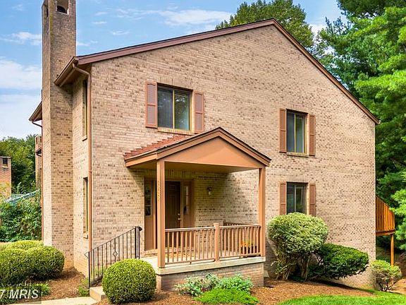 Covered front porch opens to open green space
