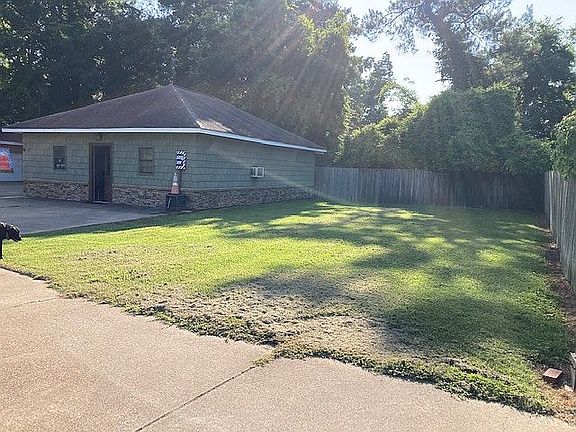 wood privacy fence and shop