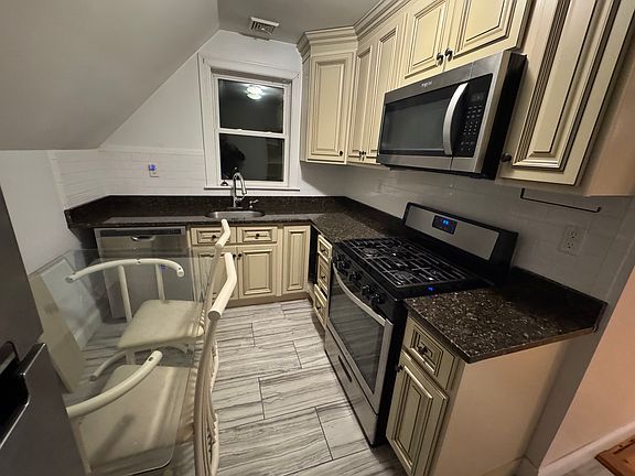 Stainless Steel appliances, dishwasher and granite countertops