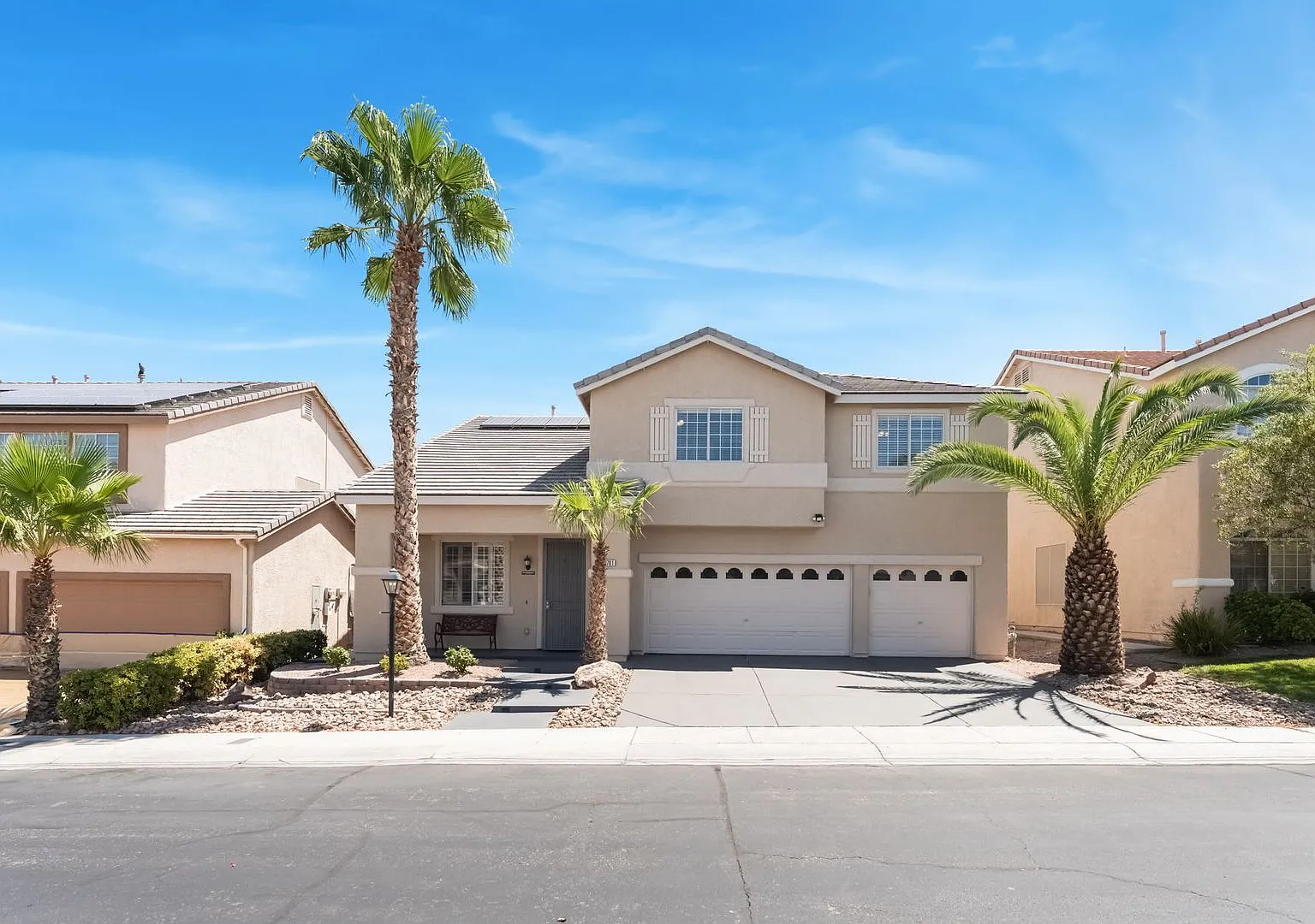 Welcome home to this spacious 5-bedroom, 2.5-bath Northwest Las Vegas home — Photo 1