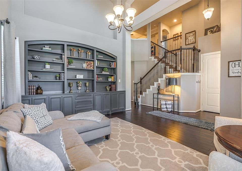A custom cabinet has been added to the space giving the room more storage.