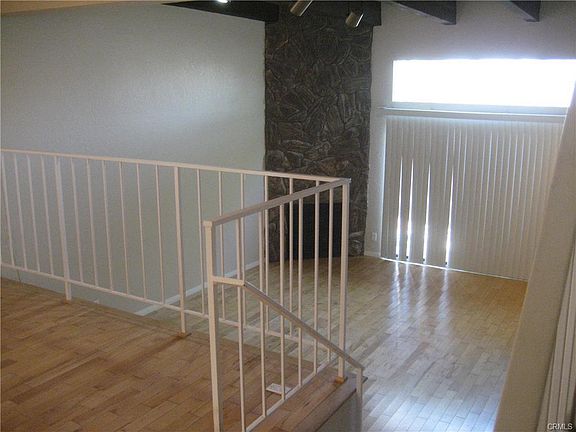 Vaulted ceilings in living room and private patio