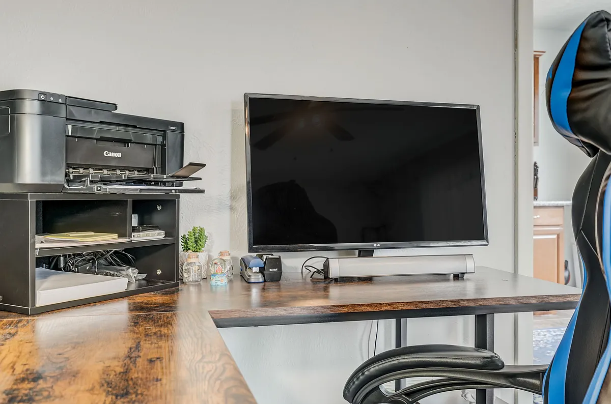 In the living room there is a dedicated work space - E Uintah St