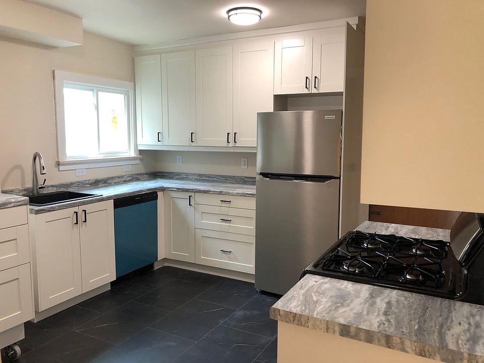 Brand new kitchen - protective film still on appliances