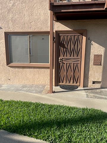 Front Door -there is an apartment unit on top with two occupants.