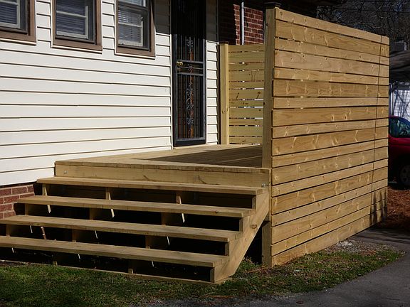 Rear View of House With Deck