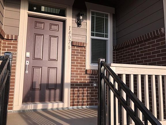Front porch with smart lock keypad and camera doorbell
