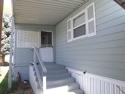Entrance has an enclosed porch convenient and easy from the covered parking