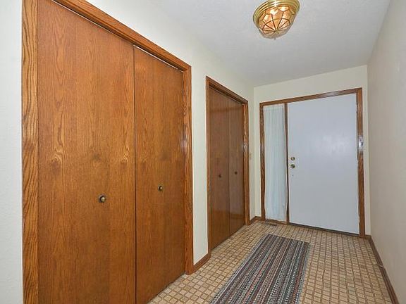 Enter into the spacious foyer from the covered maintenance free front porch.