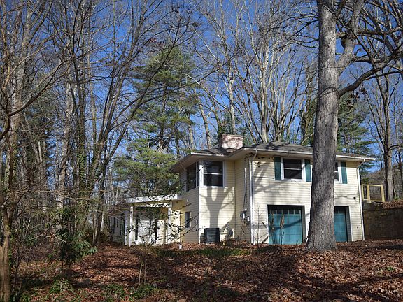 1/2-acre property surrounded by heavily wooded mature trees provide a beautiful environment in desirable neighborhood.