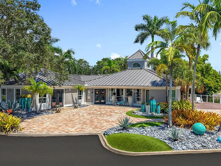 Experience the laid-back Naples lifestyle from the moment you arrive at our stylish clubhouse, featuring a lakeside deck and vibrant tropical landscaping.