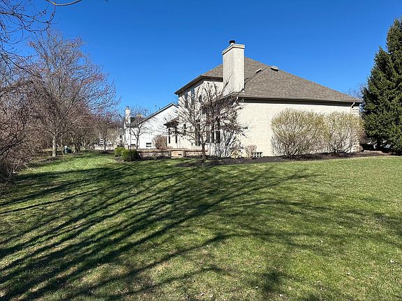 View from large side yard into the backyard.