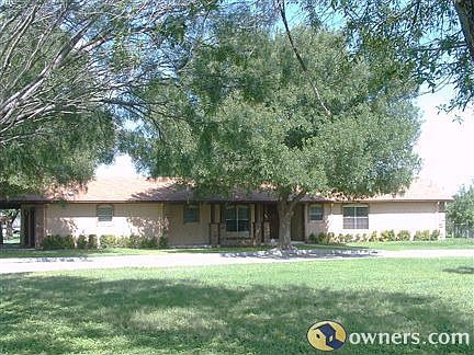 half cirlcle drive in front of house