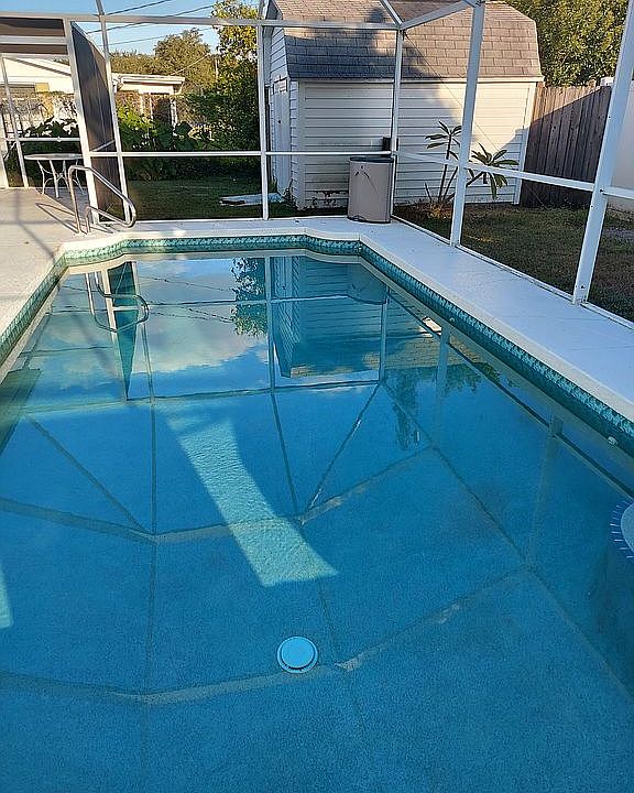 Large screened in pool.