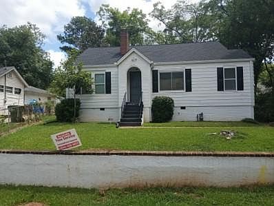 Parking pad to right of home