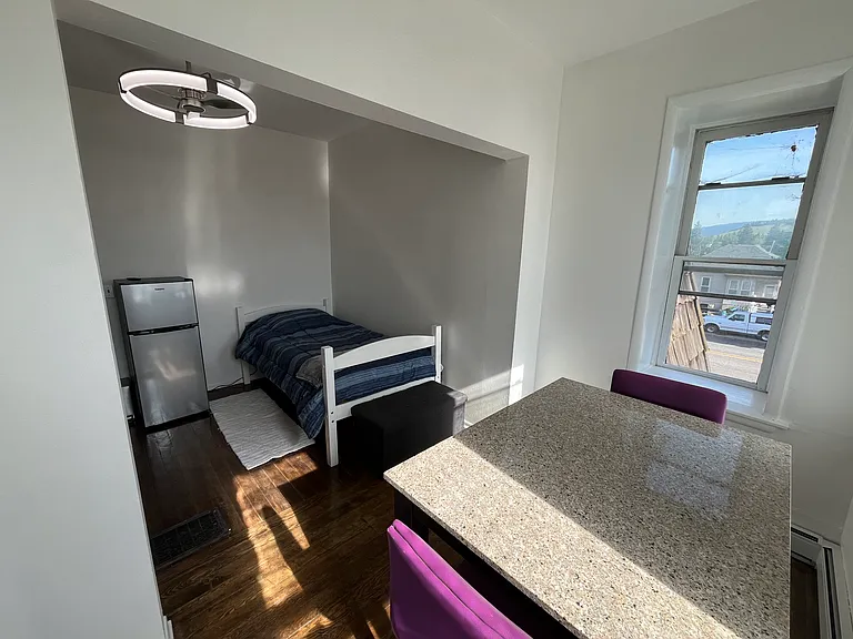 214 W Broadway St — Photo 13