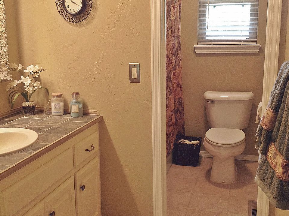 Hall bath has slate counter
