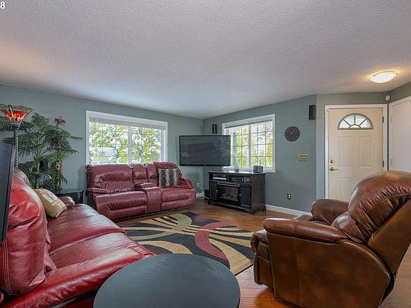 The living room. The house is unfurnished. 