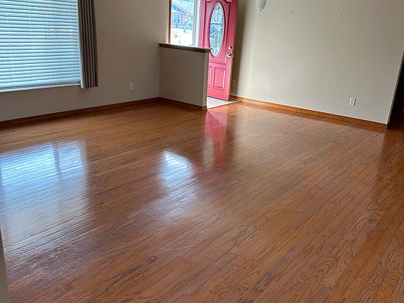 Large front room to outside porch large bay window