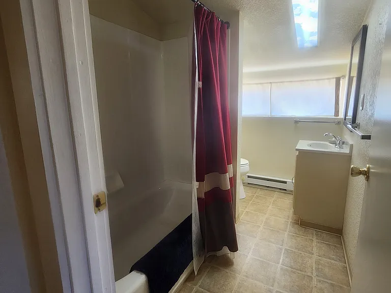 Upstairs full bath, view 1