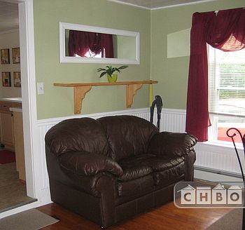 Small couch in dining area