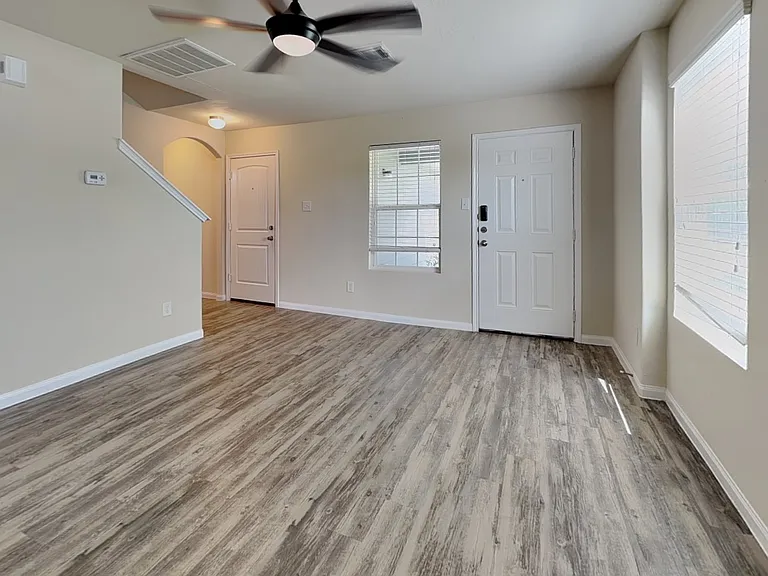 Spacious living room with neut