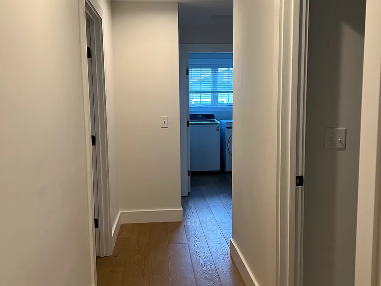 Hallway upstairs to the bedrooms, bathroom, and the laundry room