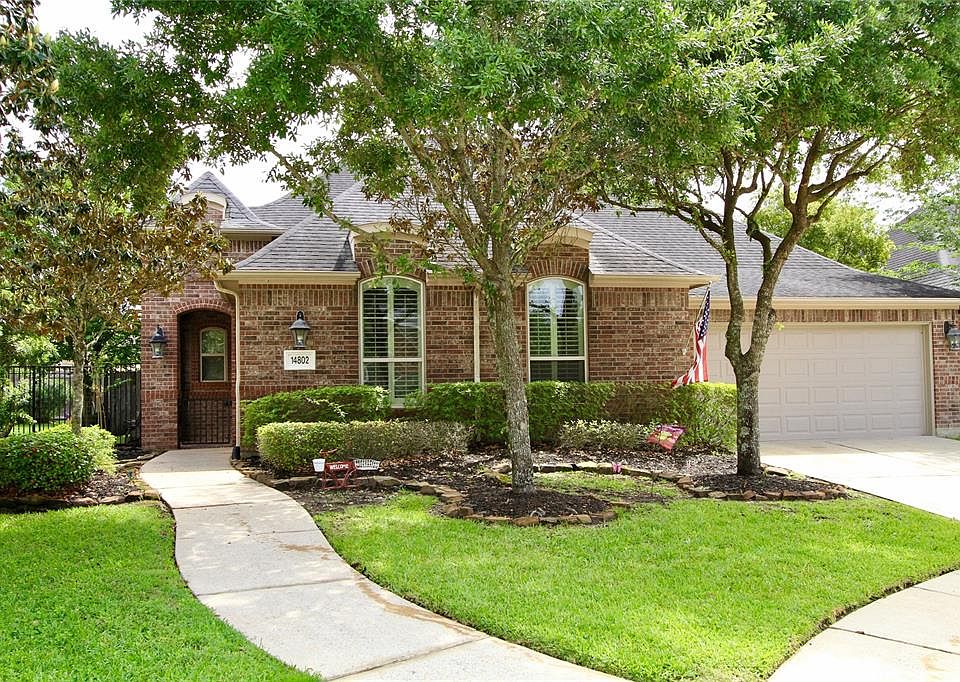Stunning One Story, Three Bedroom Home Features a Beautiful Back Yard with a Heated Pool/spa with multiple waterfalls for a serene environment!
