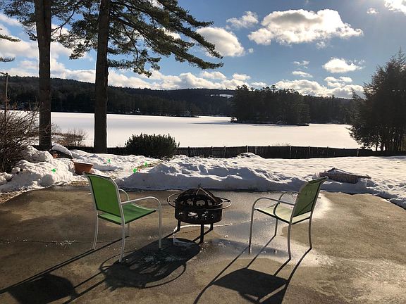 Patio in winter looking at the frozen lake