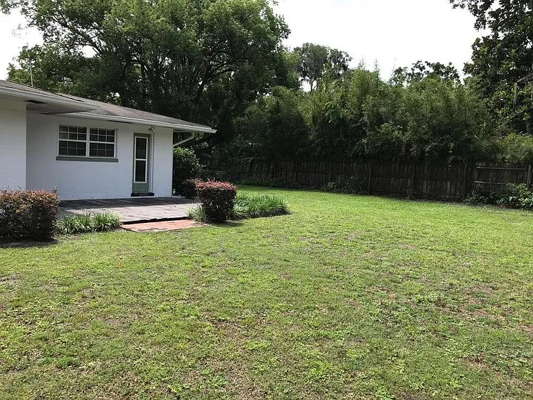 rear of home with deck