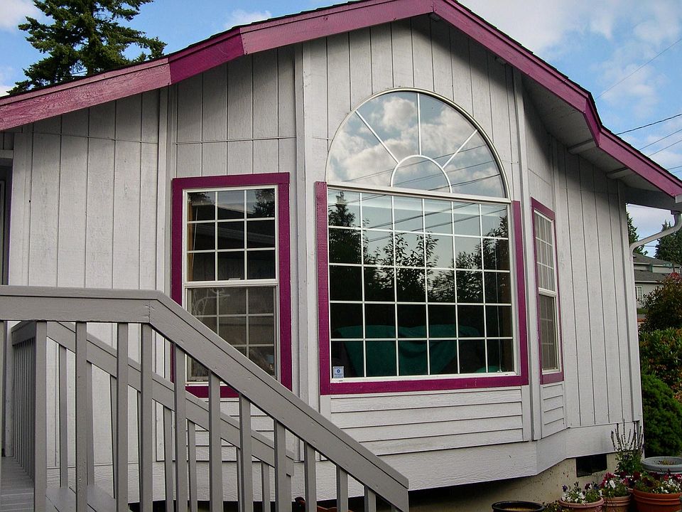 Front of the house. These large windows let in a ton of light. It's private (doesn't face the street)
