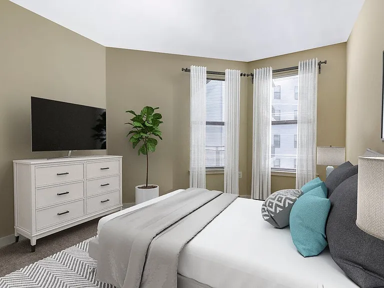 Upgraded bedroom with carpet
