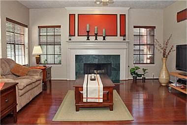 Enjoy beautiful hardwood floors & the gas fireplace in the family room