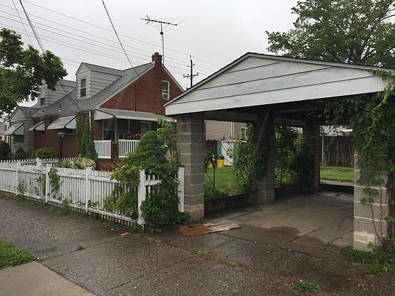 Car port and backyard.