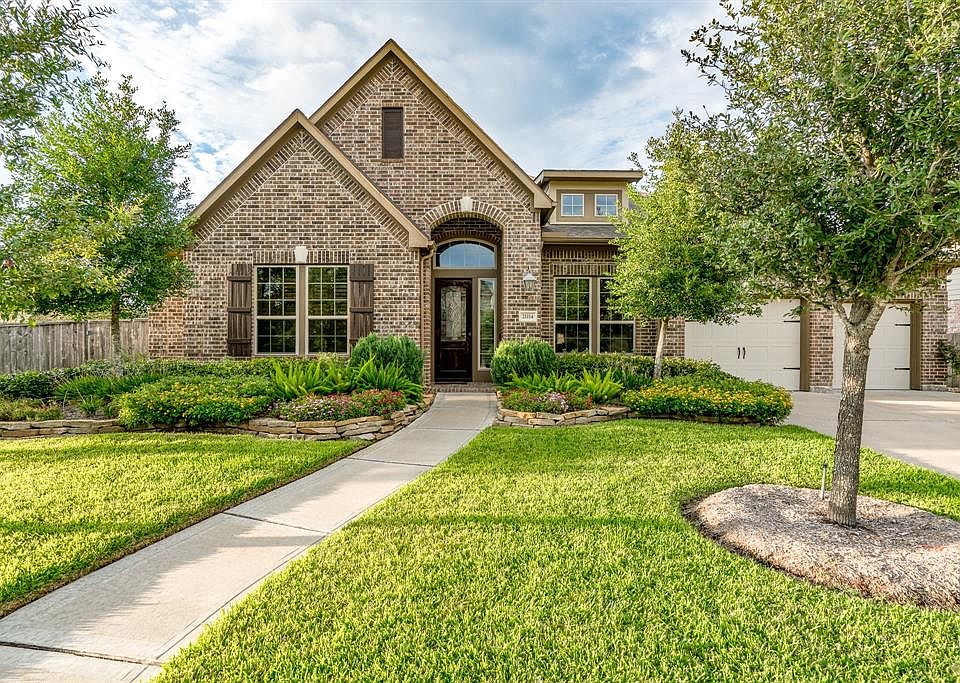 Welcome home to 21114 W. Kelsey Creek Trail! This 1.5 story Trendmaker home sits on a 110ft wide corner lot in the highly sought after section of Sterling Lake Estates in the master planned community of Fairfield.