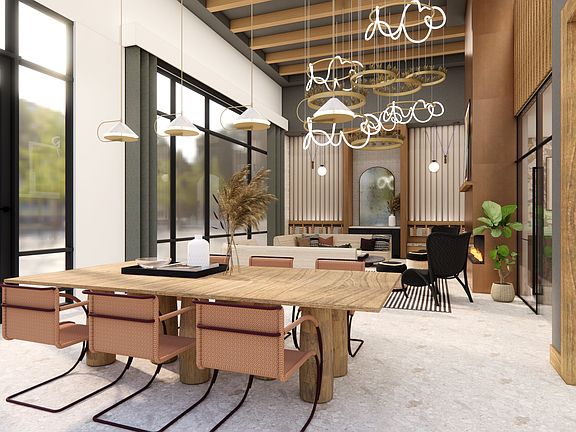 Resident lounge with gathering space, fireplace, and comfortable seating.