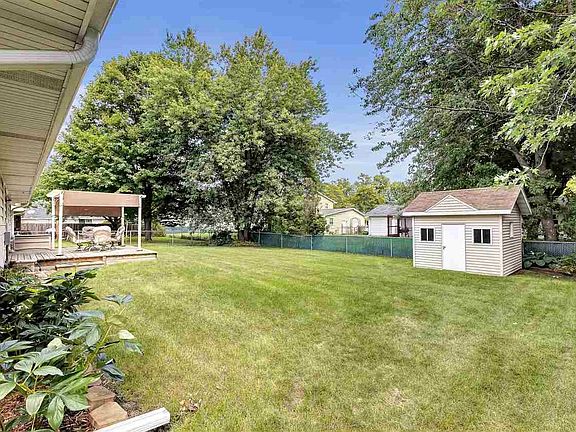 Fenced yard with shed