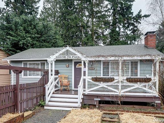 Front exterior of home with sitting porch!