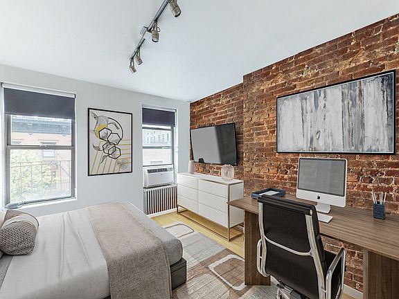 2nd image of 309 E 9th St APT 4A