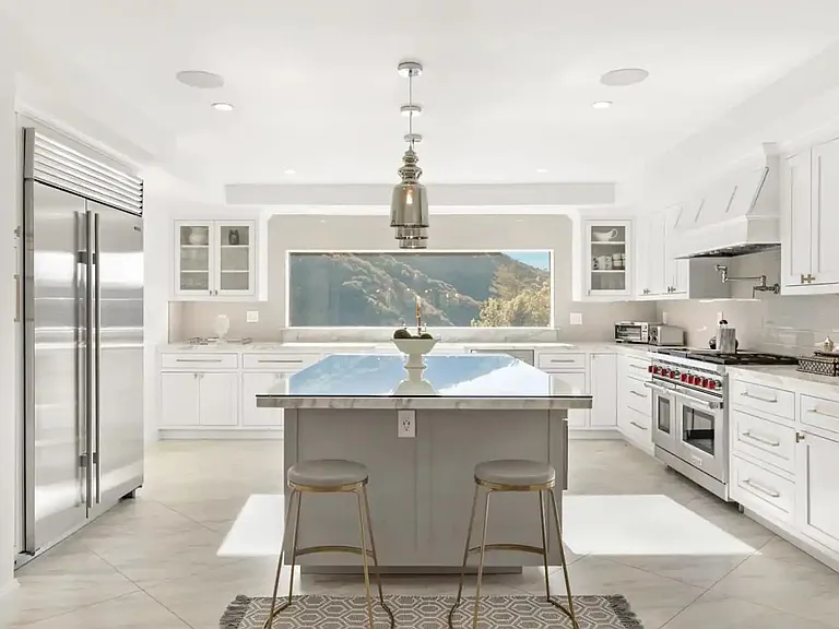Pull up a seat of this one of a kind kitchen with panoramic views of Beverly Hills.