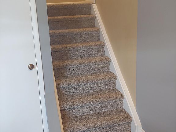 coat closet and stairway