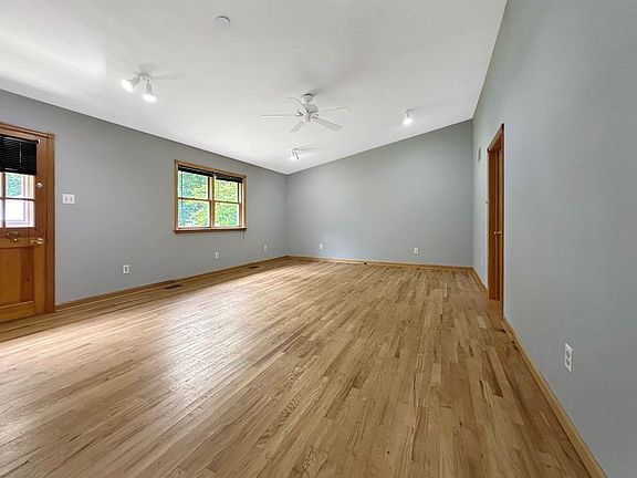 Relax with all of your housemates in this HUGE living room space with kitchen island.