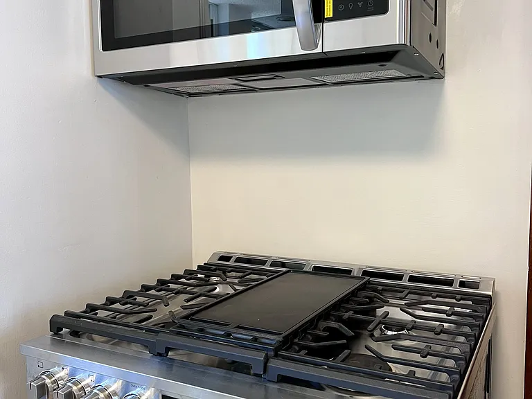 Six burner gas stove with griddle